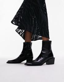 Oferta de Topshop Riley leather western boot in black por $77,4 en ASOS