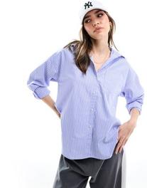 Oferta de JJXX oversized poplin shirt in blue stripe por $35 en ASOS