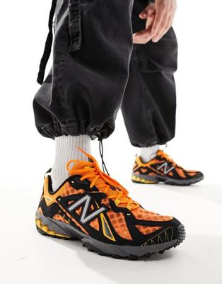 Oferta de New Balance 610 trainers in orange por $140 en ASOS