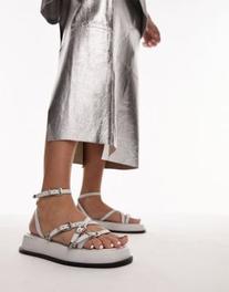 Oferta de Topshop Kayla leather strappy sandal with buckle detail in white por $61,99 en ASOS