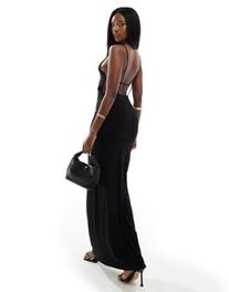 Oferta de ASOS DESIGN halter maxi dress with plunge back and strapping detail in black por $26,59 en ASOS