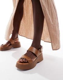 Oferta de ALDO Thilda chunky slingback sandals in cognac por $75,99 en ASOS