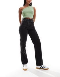 Oferta de Weekday Rowe extra high waist regular fit straight leg jeans in Echo Black por $71,99 en ASOS