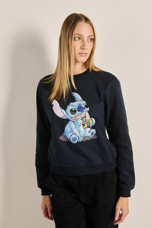 Oferta de Buzo unicolor con diseño de Stitch y cuello redondo por $59900 en Koaj
